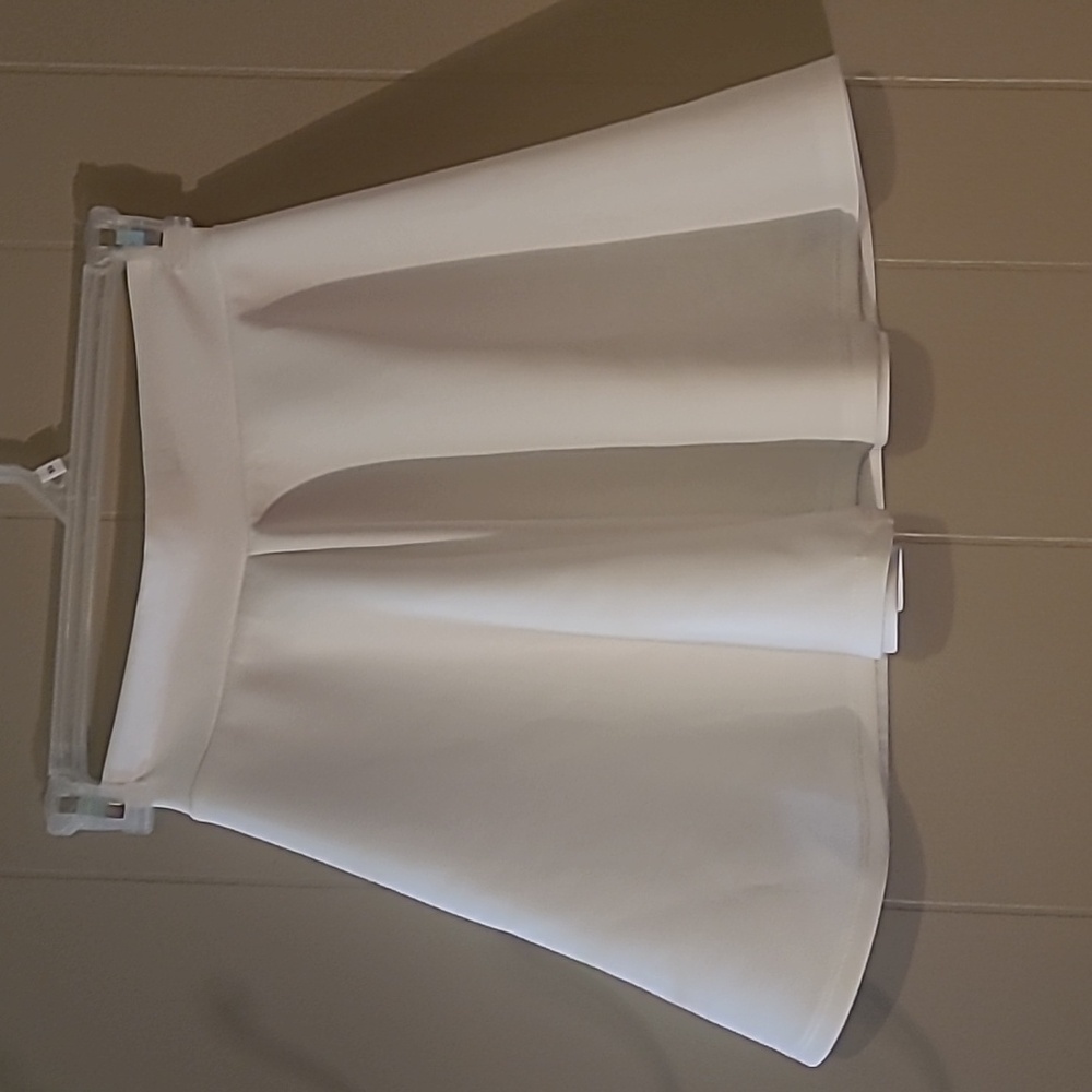 White skirt mid thigh length Size M